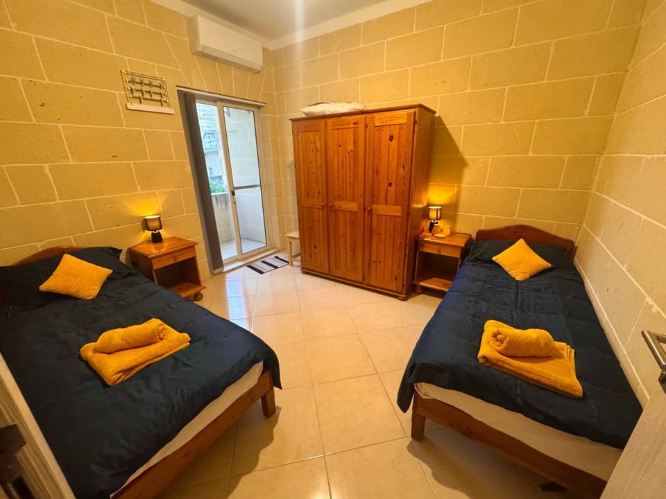 Bed, Photo of the whole room, Bedroom, towels, wardrobe, air conditioner