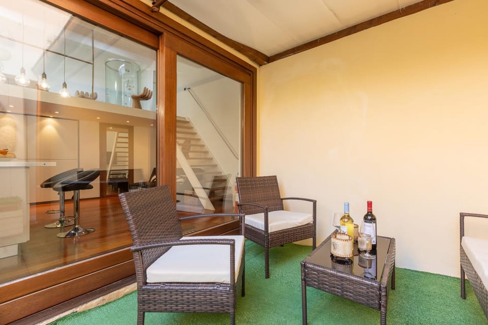 Open Space with Air Conditioning and Patio Privato Apartment in Alghero