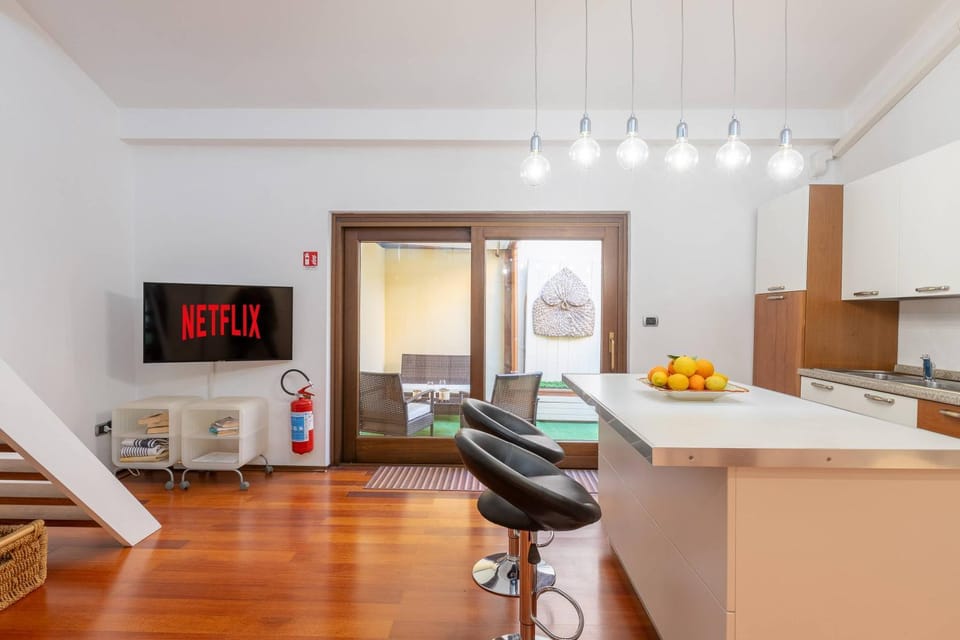 Open Space with Air Conditioning and Patio Privato Apartment in Alghero