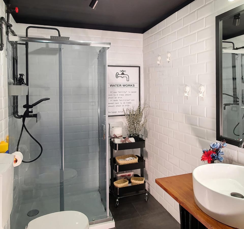 Shower, Toilet, Bathroom, hair dryier, towels