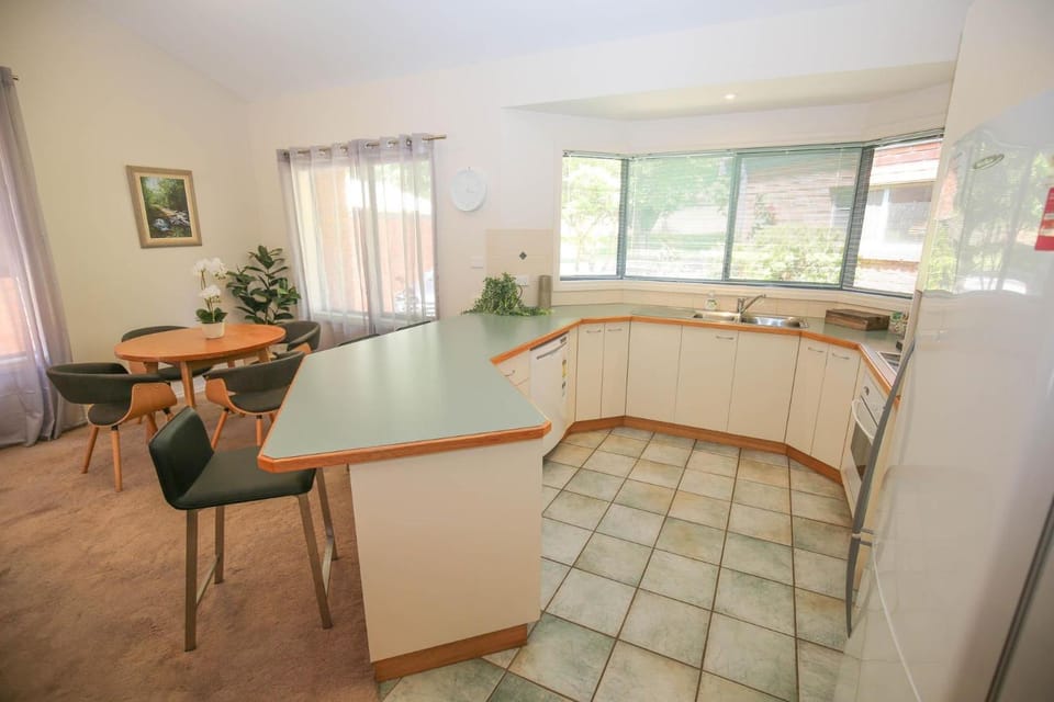 Kitchen or kitchenette, Living room, Seating area, Dining area, dishwasher, oven, stove