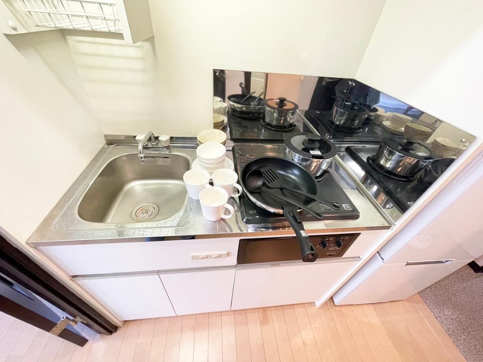 Kitchen or kitchenette, stove