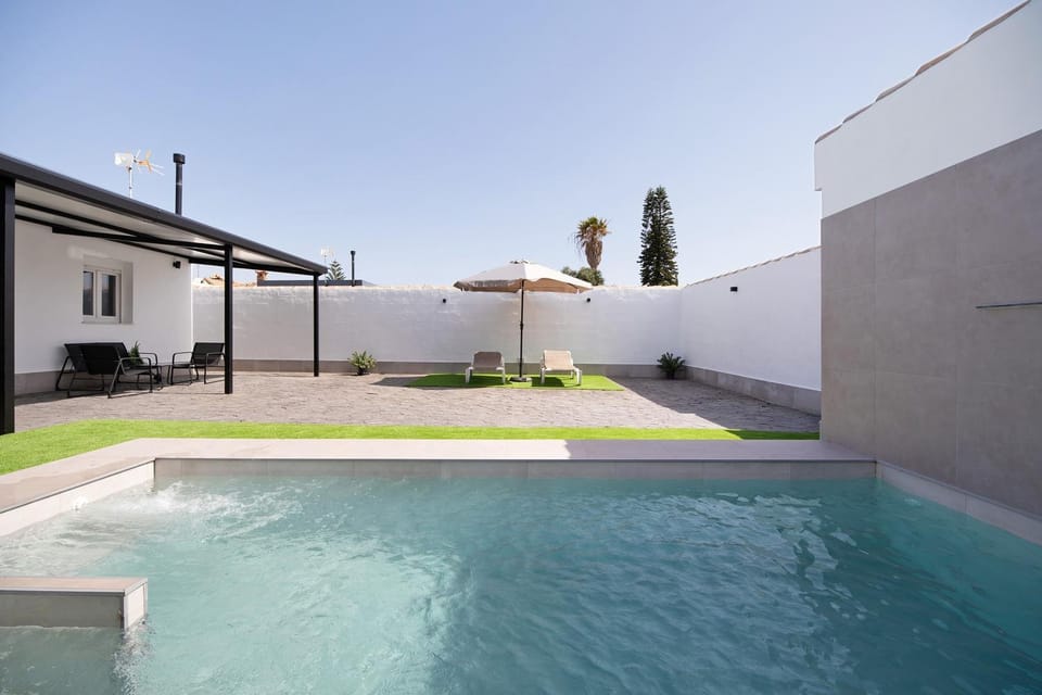 Property building, Living room, Swimming pool