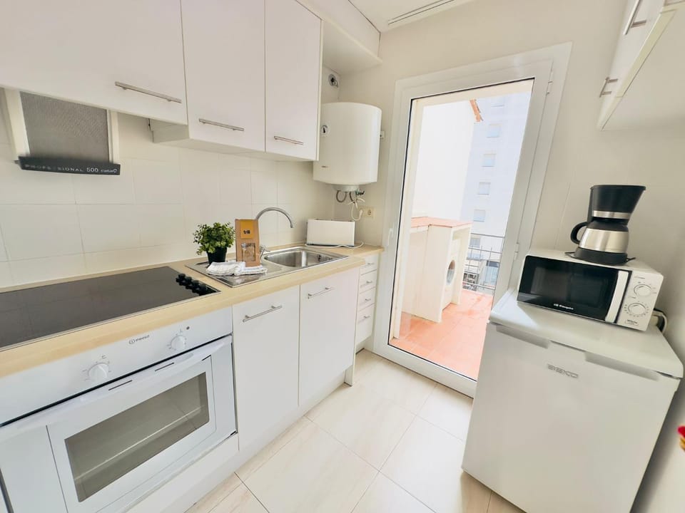 Kitchen or kitchenette, oven, stove, toaster
