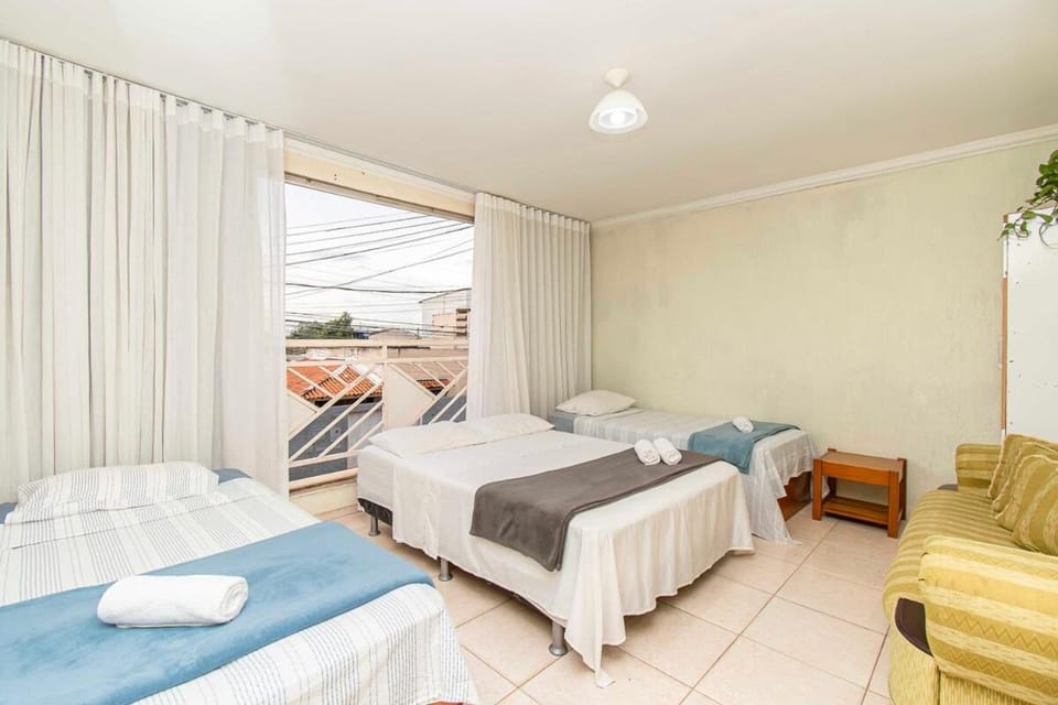 Quarto familiar, 1 cama de casal e 2 de solteiro Vacation rental in State of Goiás
