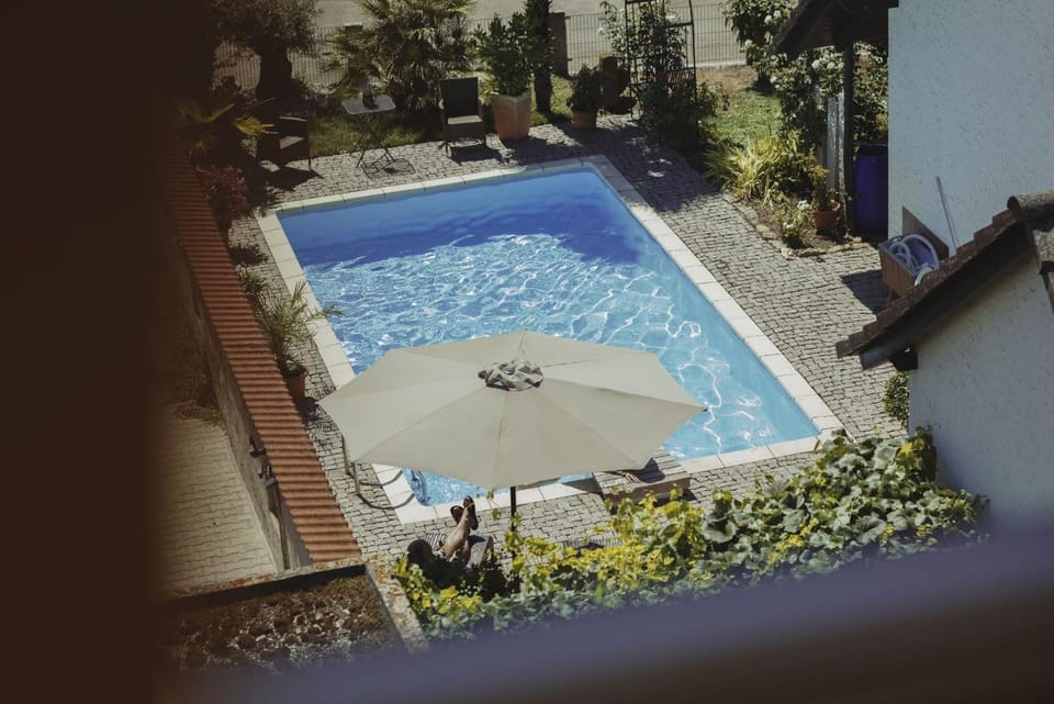 Property building, Living room, Swimming pool
