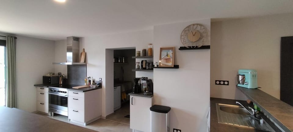 Kitchen or kitchenette, dishwasher, oven, stove, toaster