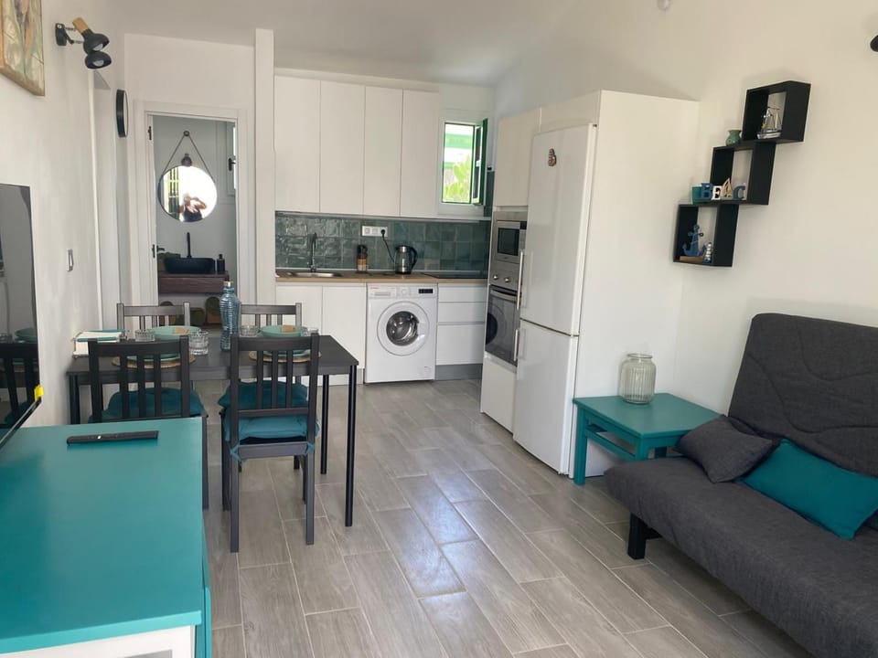 Dining area, oven, stove, washing machine, kitchen