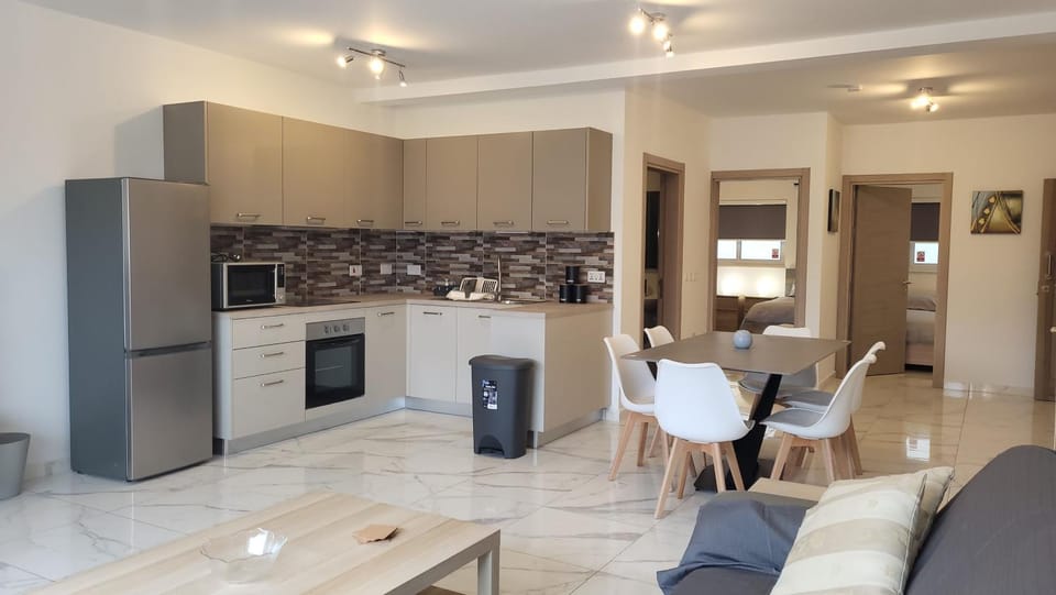 Kitchen or kitchenette, Living room, Seating area, oven, stove