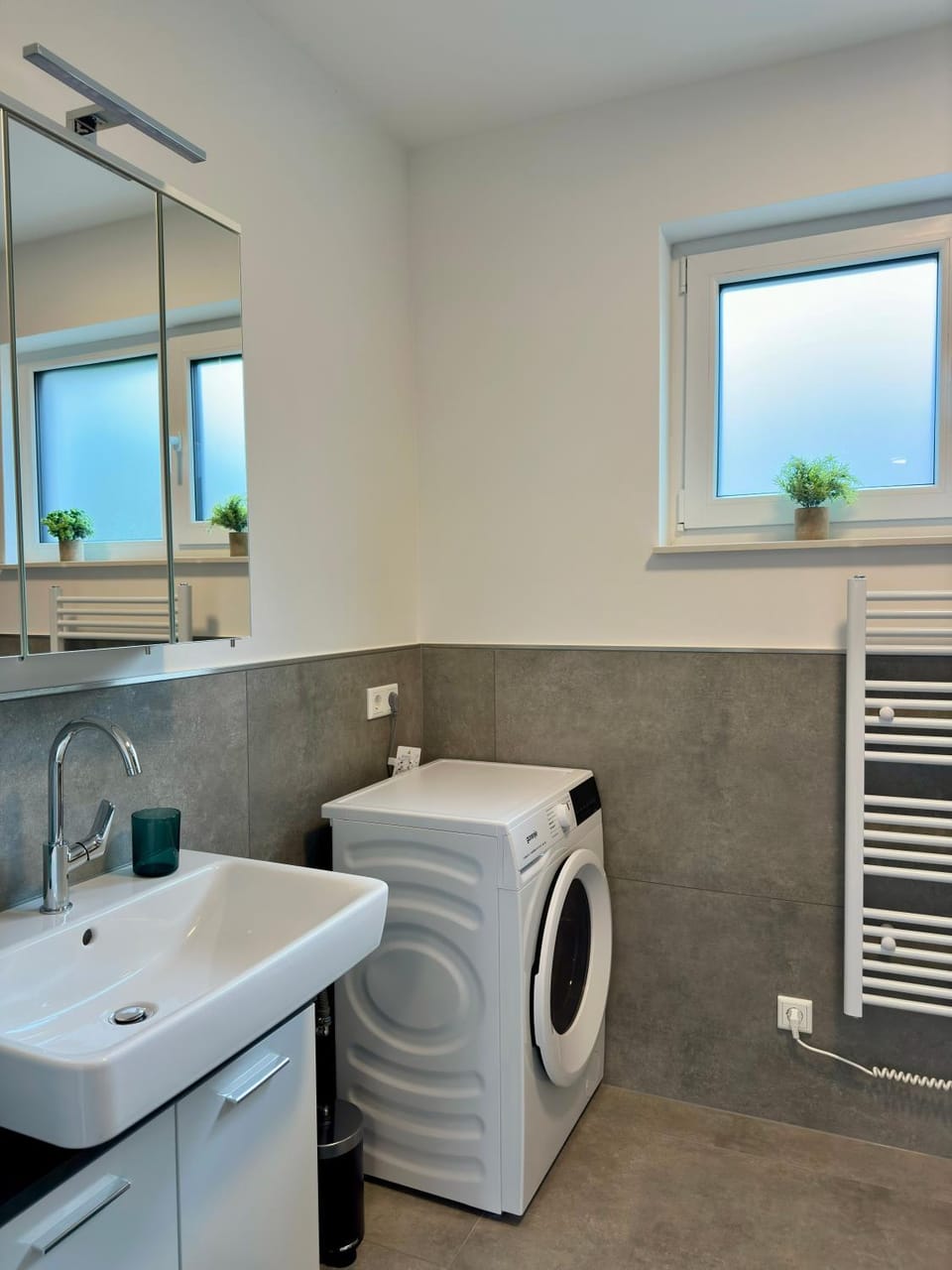 Bathroom, towels, washing machine, dryer