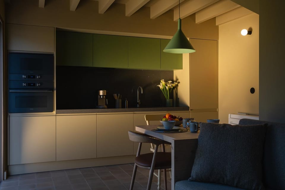 Kitchen or kitchenette, Living room, Seating area, Dining area, microwave, stove, air conditioner