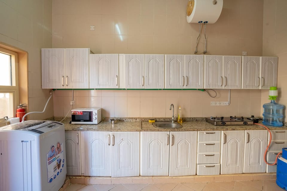 Kitchen or kitchenette, oven, stove