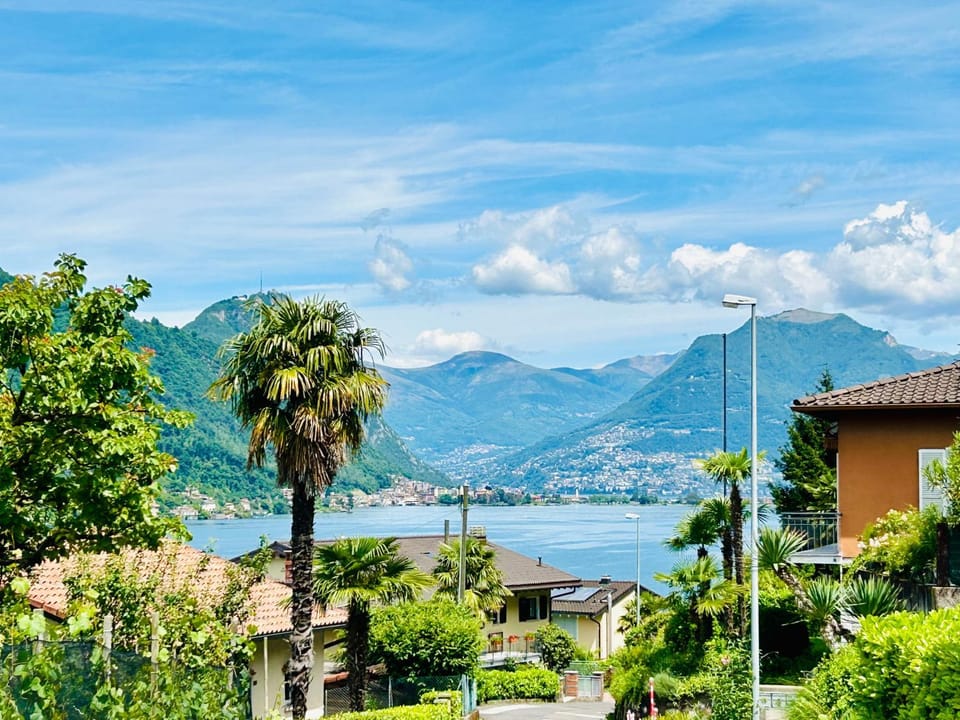 Property building, Natural landscape, Lake view, Mountain view