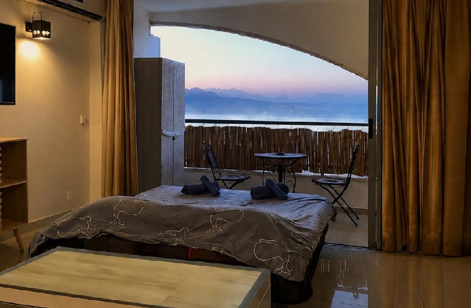 Neighbourhood, View (from property/room), Living room, Mountain view, Sea view, bunk bed