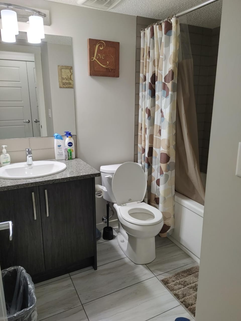 Shower, Toilet, Bathroom, Bath, bidet, flat iron, hair dryier, towels, dryer