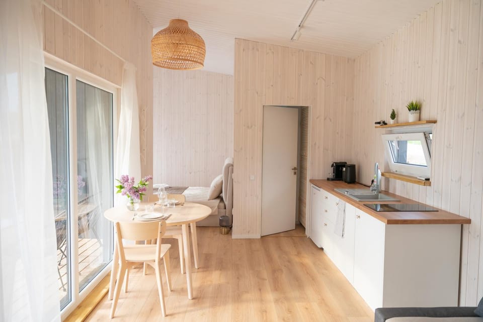 Pineplace trio JŪRA House in Vilnius County, Lithuania