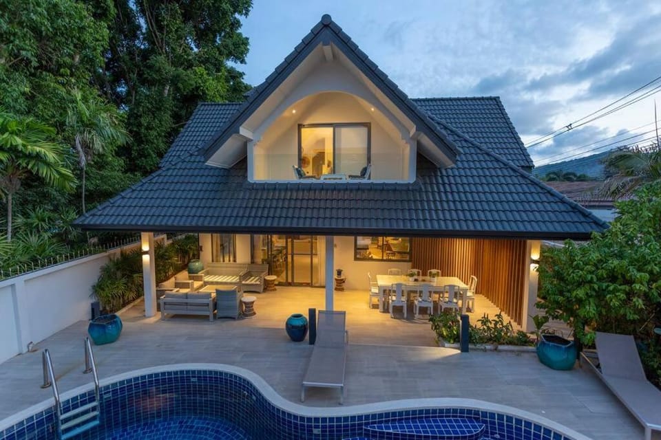 Property building, Patio, Day, Natural landscape, Pool view, Swimming pool, sunbed