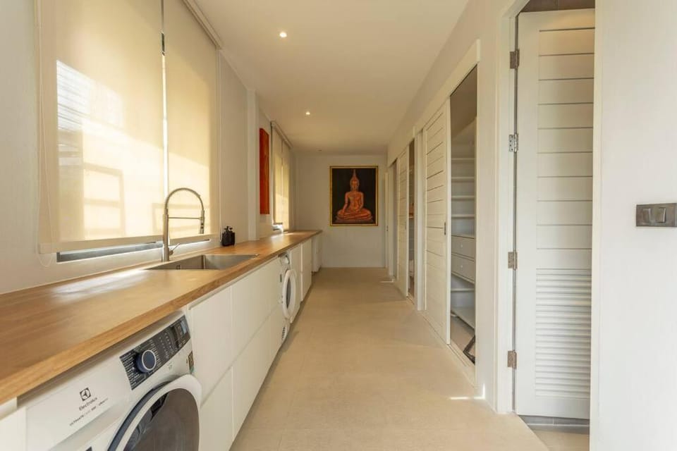 Kitchen or kitchenette, dishwasher, stove, washing machine, dryer