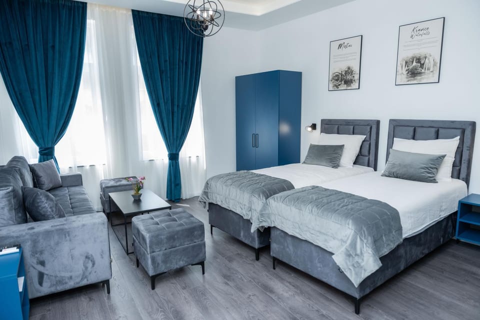 Bed, Living room, Seating area, Bedroom