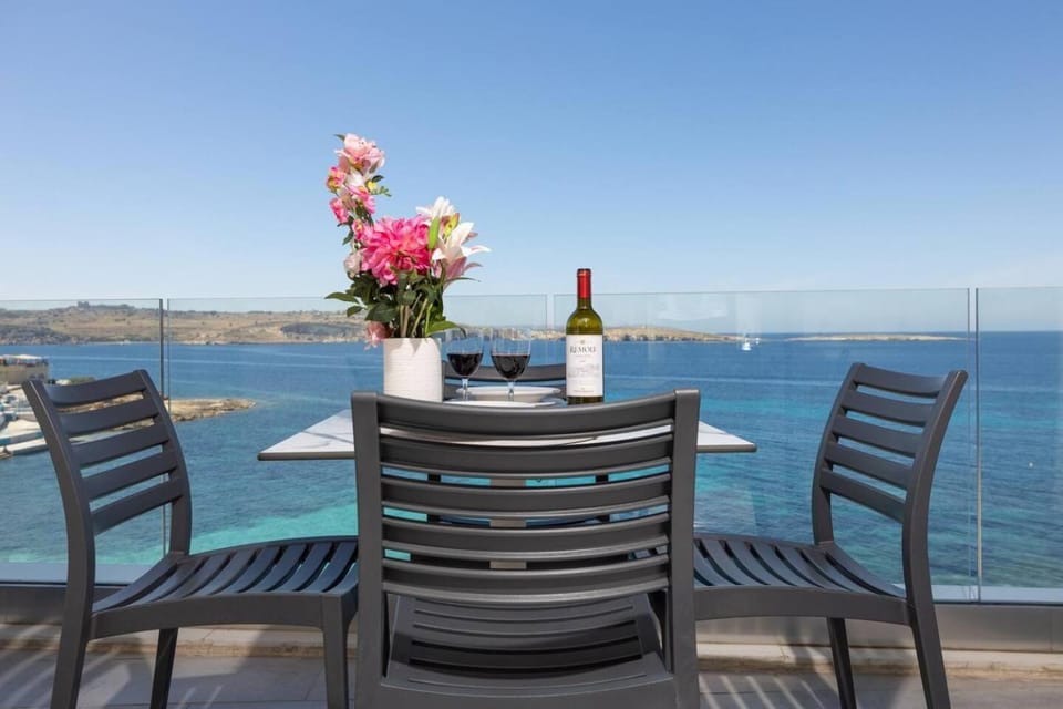 Ivory Suite seafront with views!- Fl 14 by Homely Apartment in Saint Paul's Bay