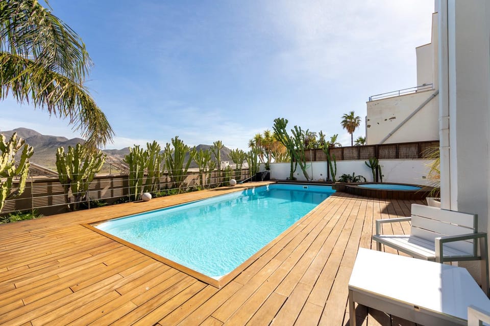 Property building, Living room, Swimming pool