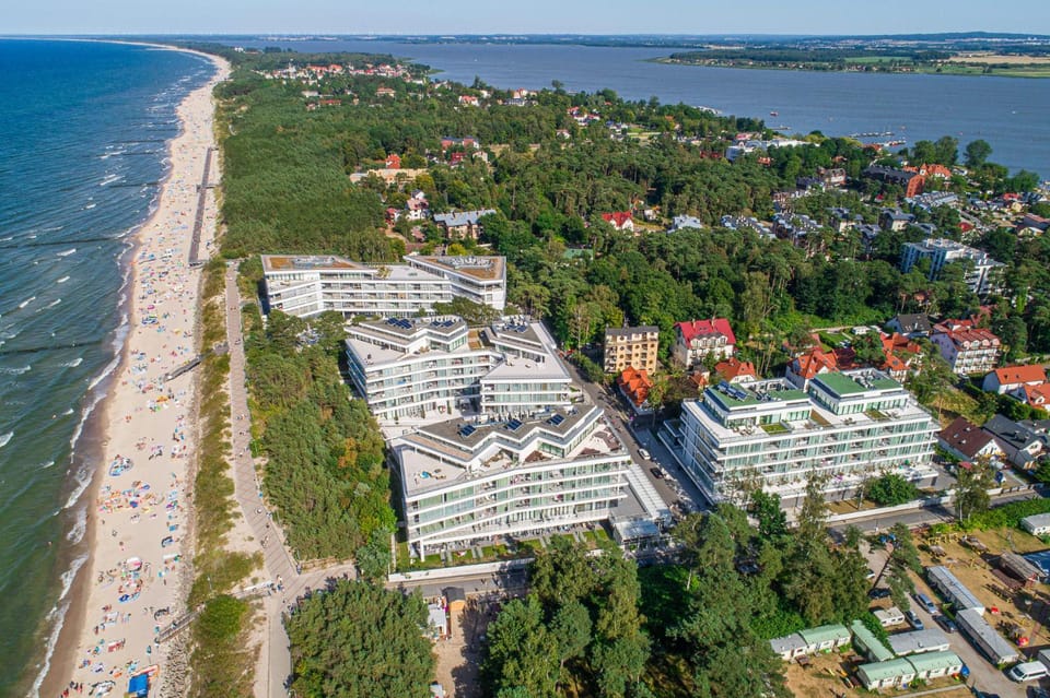 Property building, Nearby landmark, Day, Natural landscape, Bird's eye view, Beach, City view, Sea view