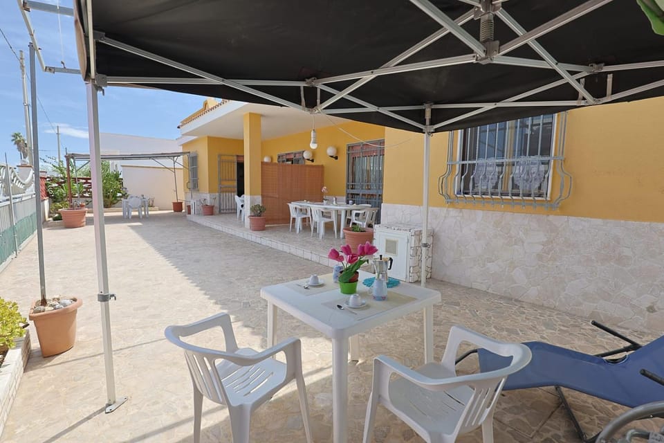 Property building, Patio, Day, Garden, View (from property/room), Dining area