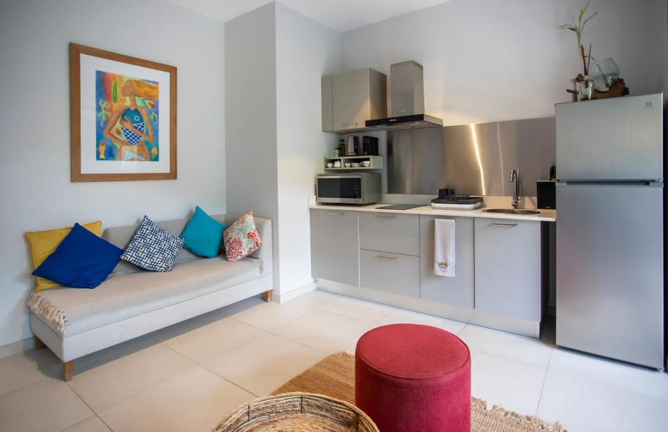 Kitchen or kitchenette, Living room, Photo of the whole room, Seating area, stove
