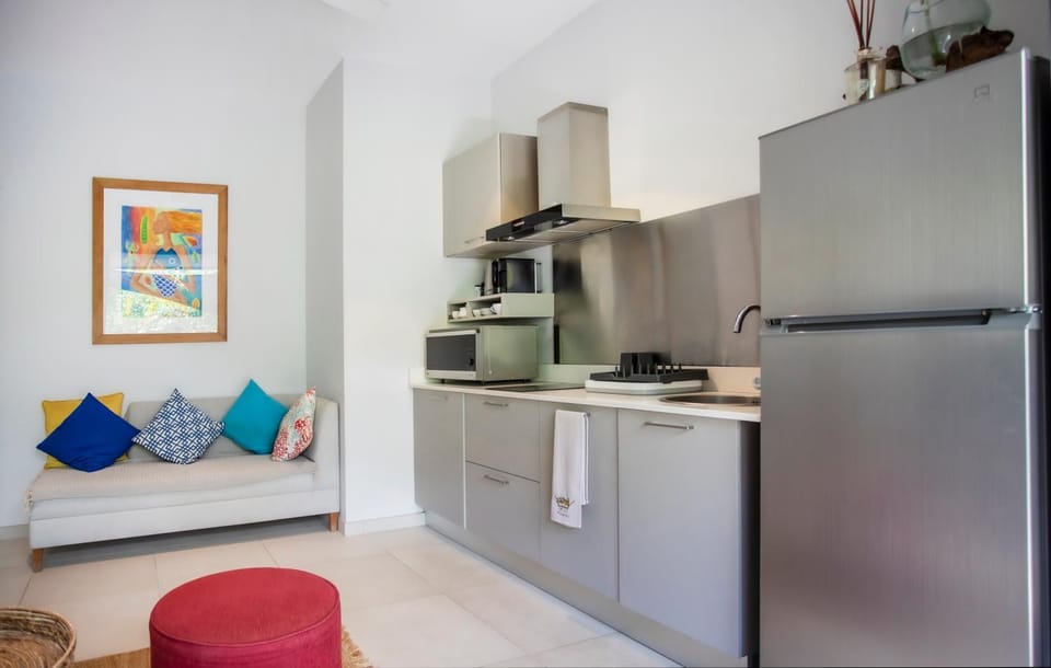Kitchen or kitchenette, dishwasher, oven, stove
