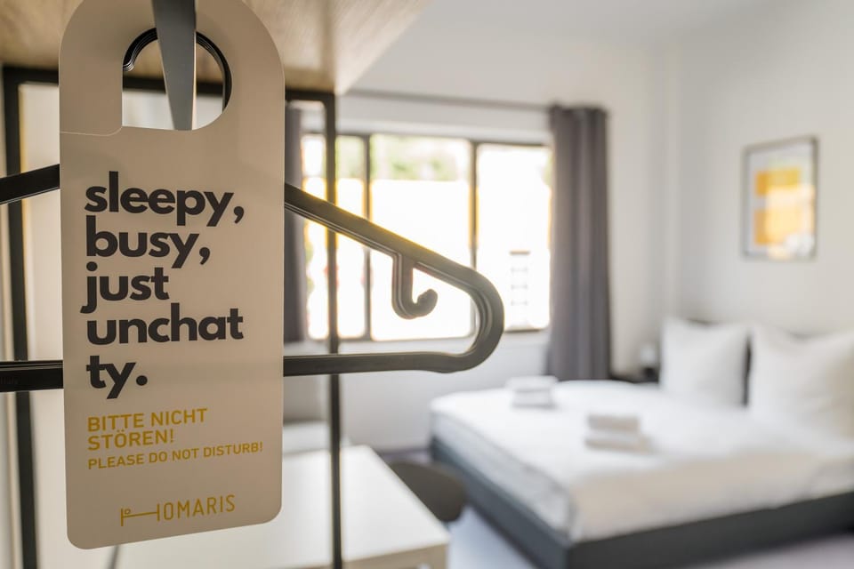 Bed, Property logo or sign, Bedroom