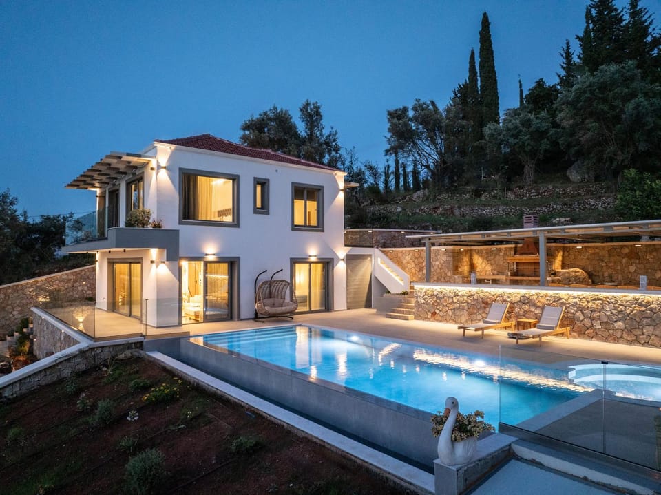 Property building, Patio, Night, Natural landscape, Pool view, Swimming pool, sunbed