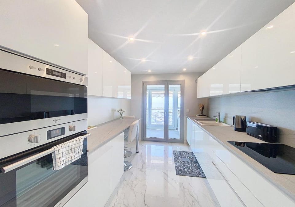 Kitchen or kitchenette, dishwasher, oven, stove, toaster