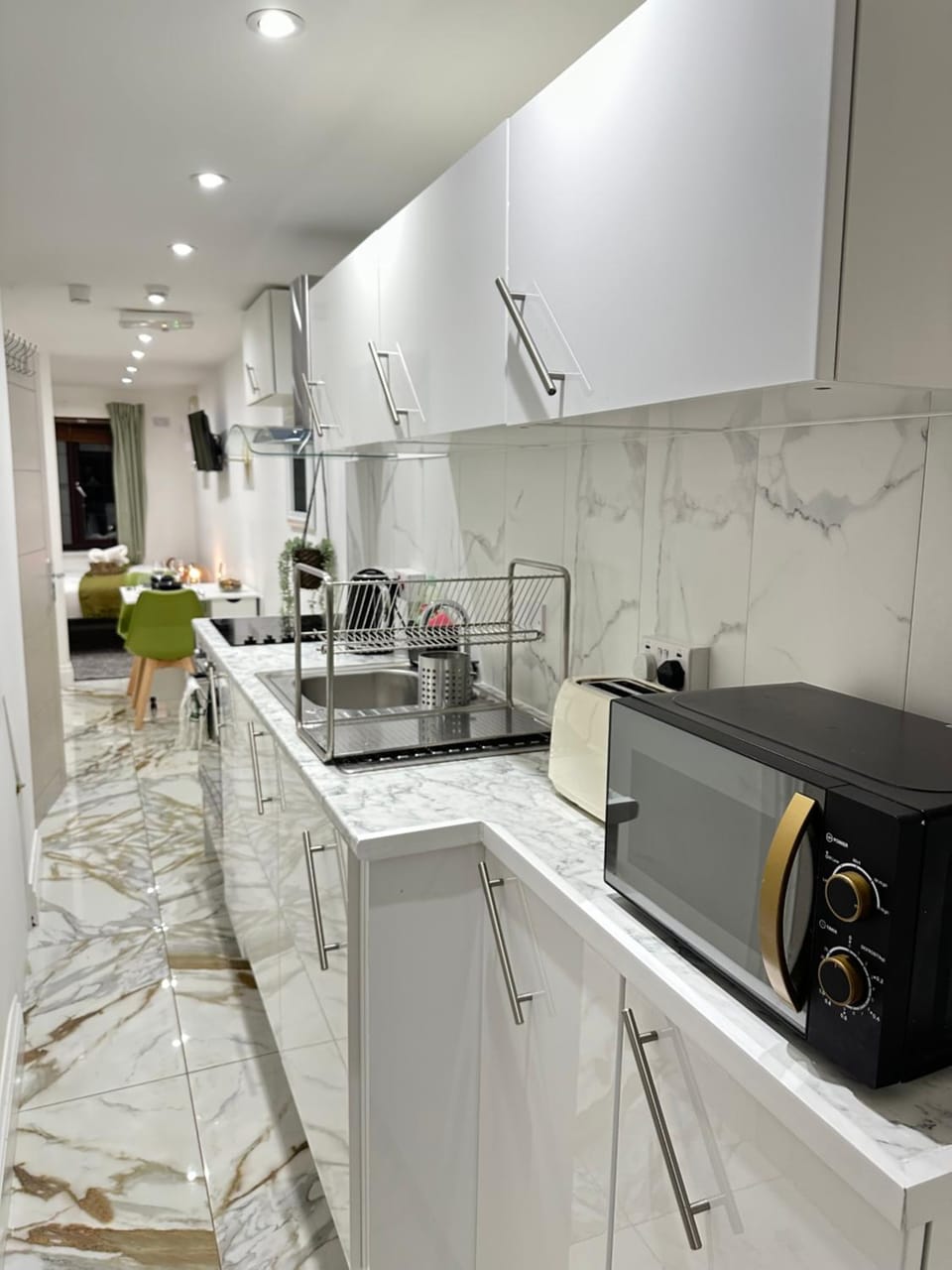 Kitchen or kitchenette, stove, toaster