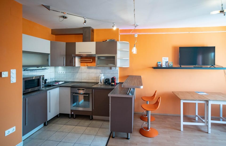 Kitchen or kitchenette, oven, stove, toaster