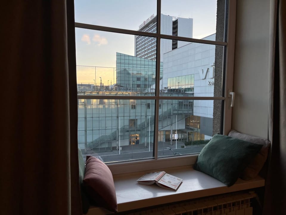 View (from property/room), Living room, Seating area, City view