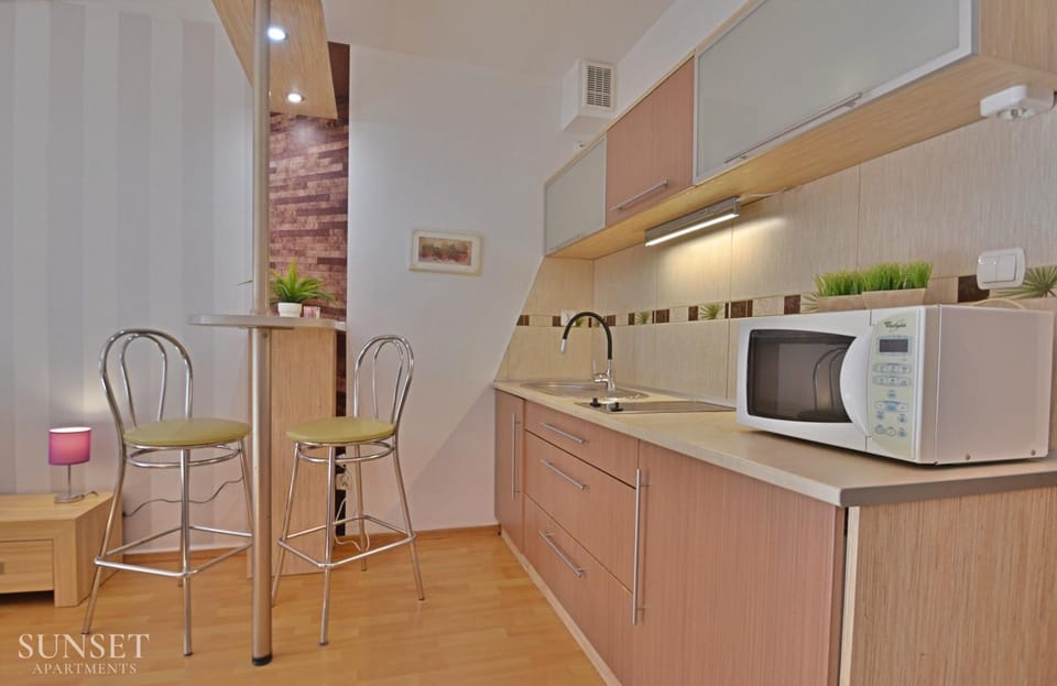 Kitchen or kitchenette, oven, stove, toaster