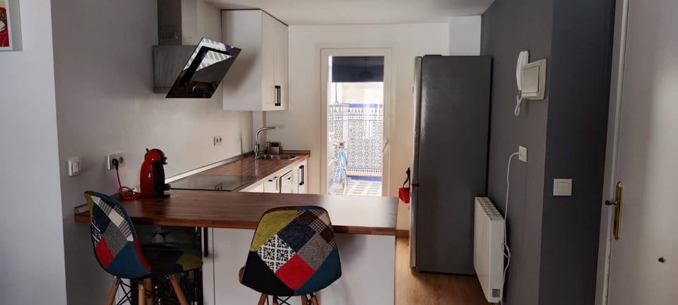 Kitchen or kitchenette, stove