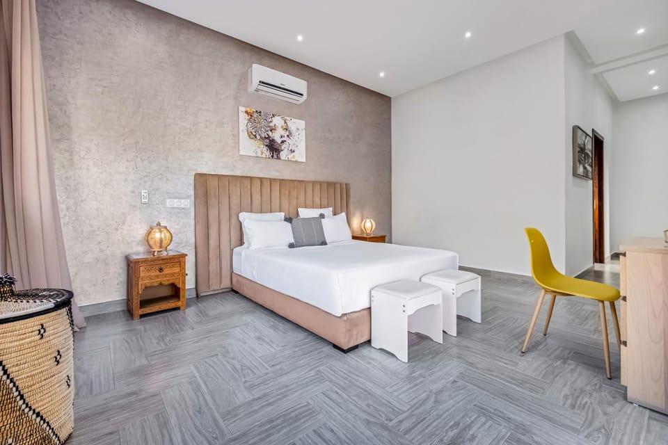 Bed, Living room, Seating area, Bedroom, hair dresser, air conditioner