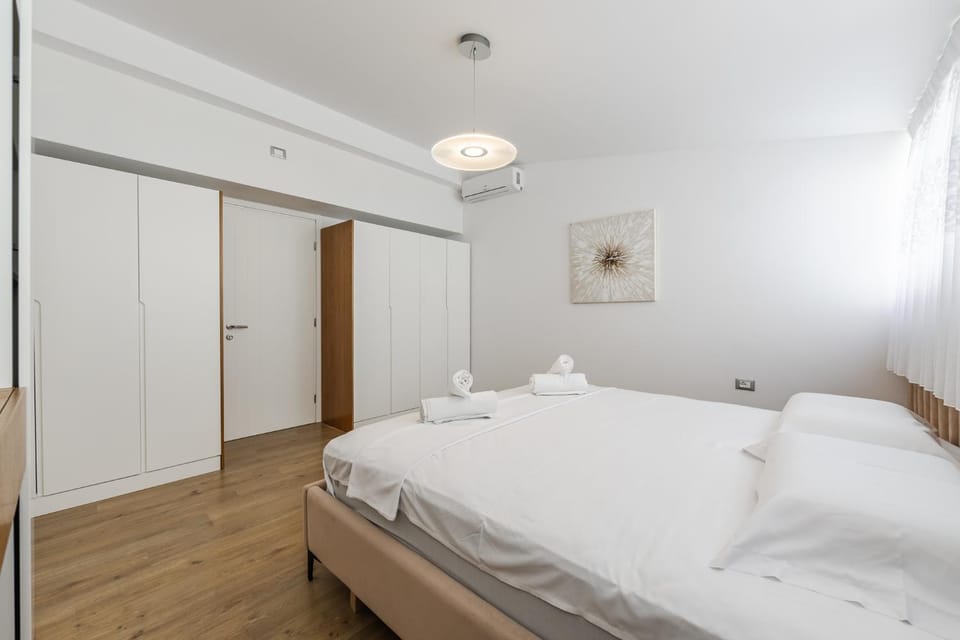 Bed, Photo of the whole room, Bedroom, towels, wardrobe