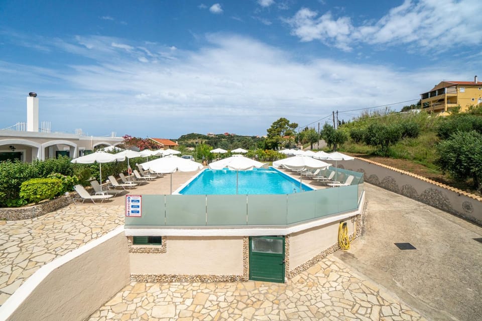 Property building, Living room, Swimming pool