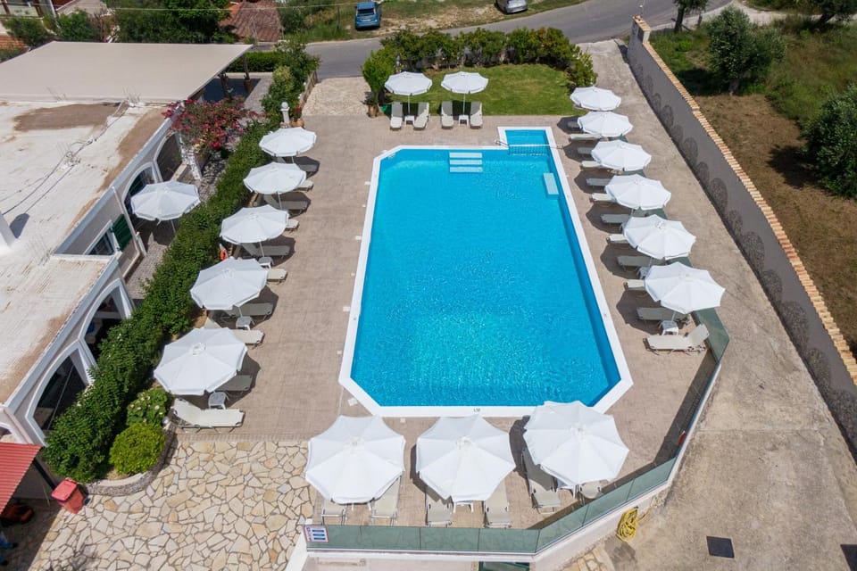 Property building, Living room, Swimming pool