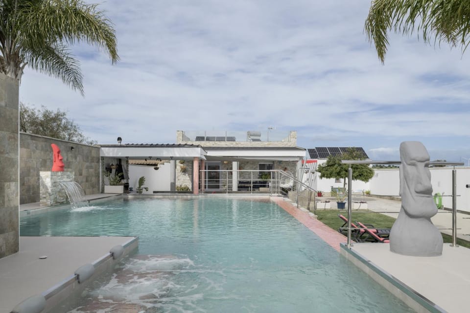 Property building, Living room, Swimming pool