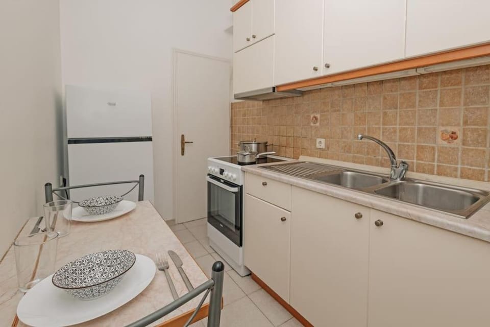 Kitchen or kitchenette, stove