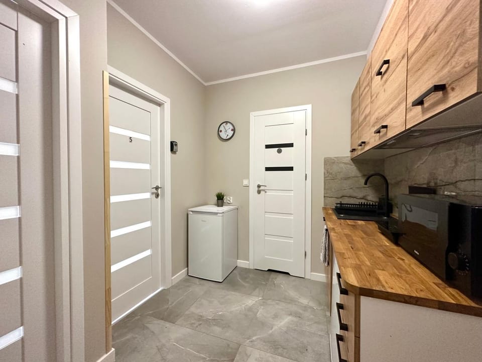 Kitchen or kitchenette, stove