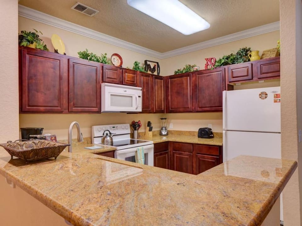 Kitchen or kitchenette, oven, stove, toaster