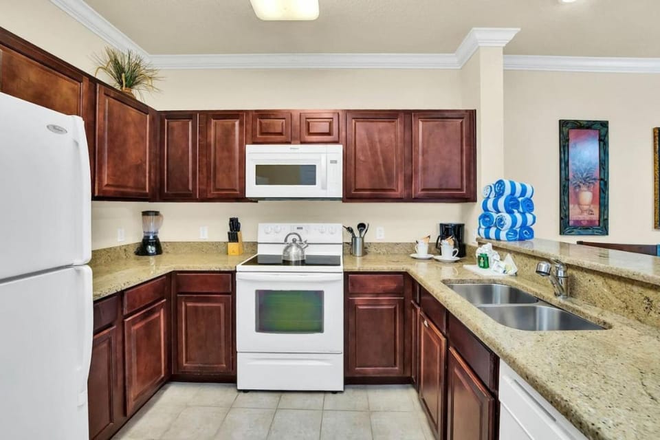 Kitchen or kitchenette, dishwasher, oven, stove, toaster