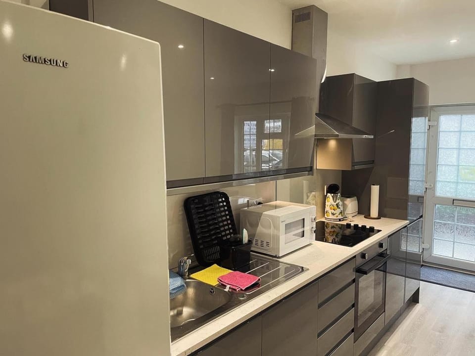 Kitchen or kitchenette, oven, stove, toaster