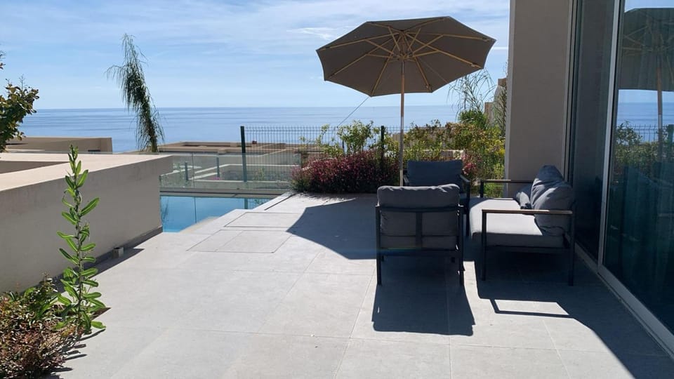 Patio, Day, Natural landscape, View (from property/room), Balcony/Terrace, Living room, Seating area, Pool view, Sea view, Swimming pool, sunbed