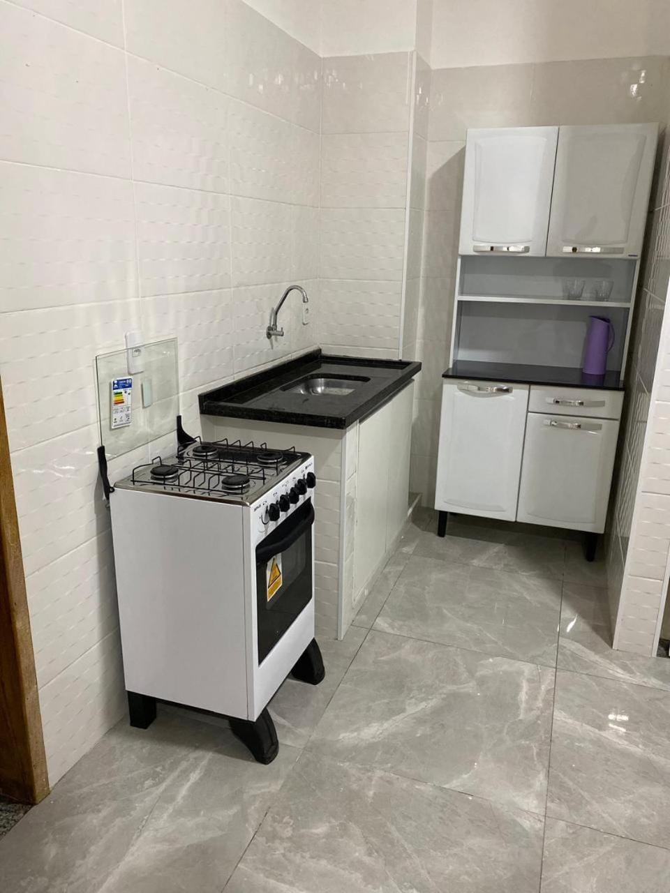 Kitchen or kitchenette, oven, stove
