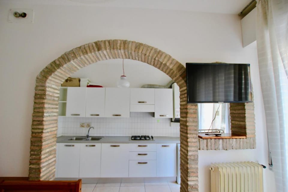 Kitchen or kitchenette, stove